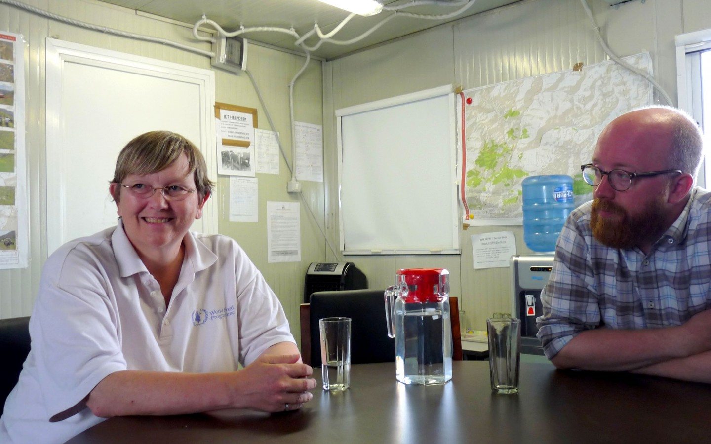 Dorothy Hector, National Coordinator for Remote Access Operations in Nepal, and John Myraunet, National Logistics Cluster Coordinator, WFP.