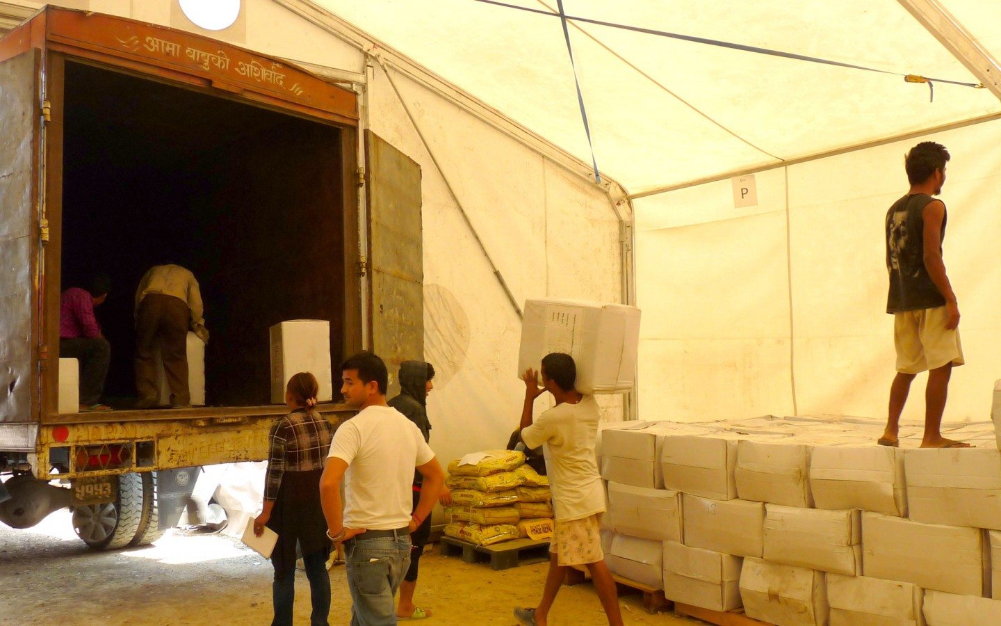 Supplies are loaded up for distribution from the WFP base in Kathmandu. 