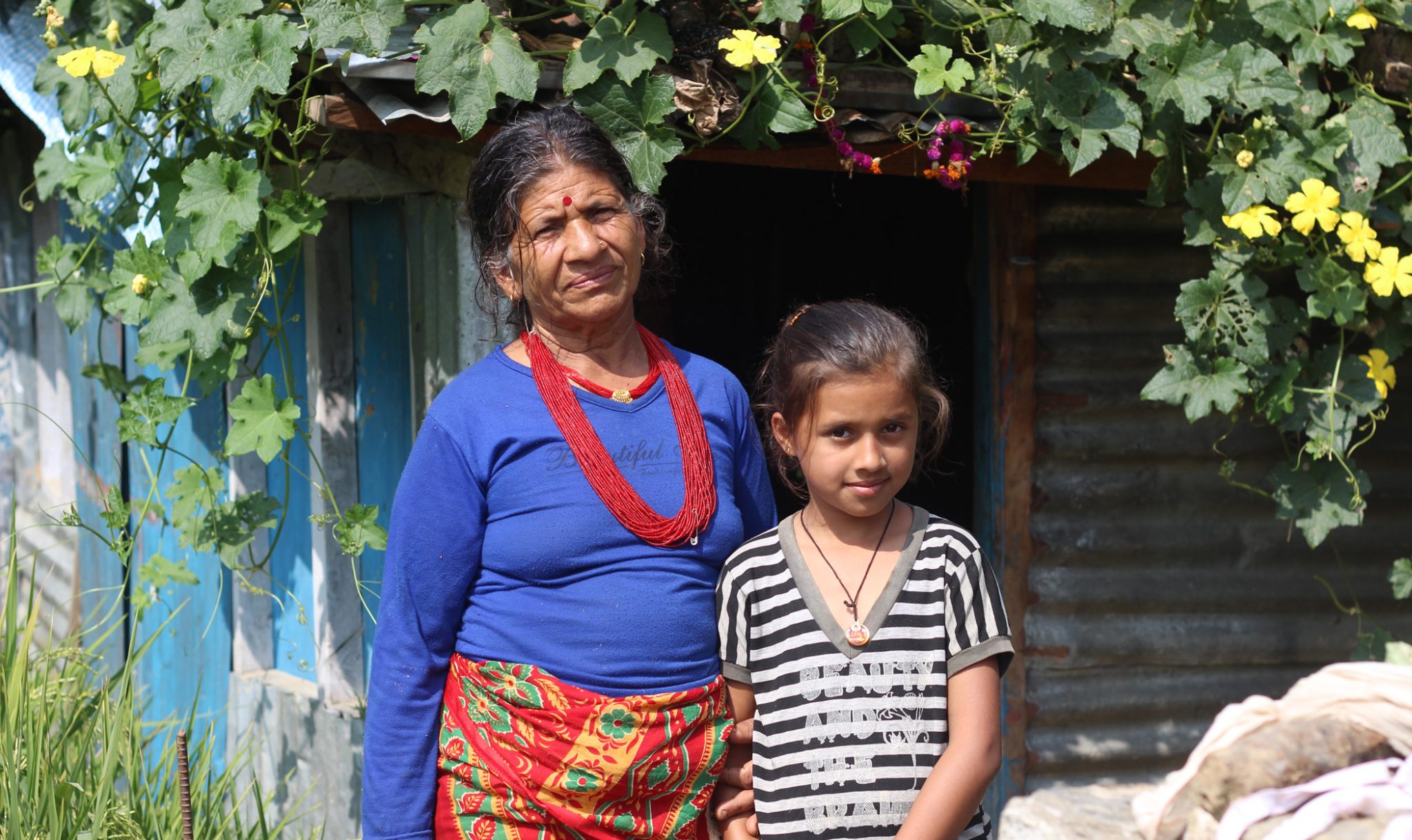 Bal Kumari Parajuli and her granddaughter, Dikshika, who now lives in Kathmandu with her parents 