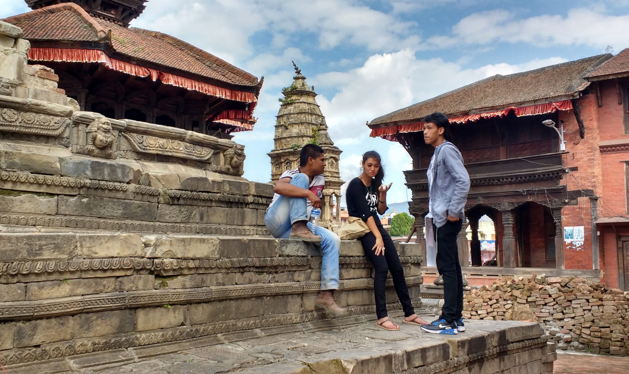 Locals relax in Bhaktapur Durbar Square