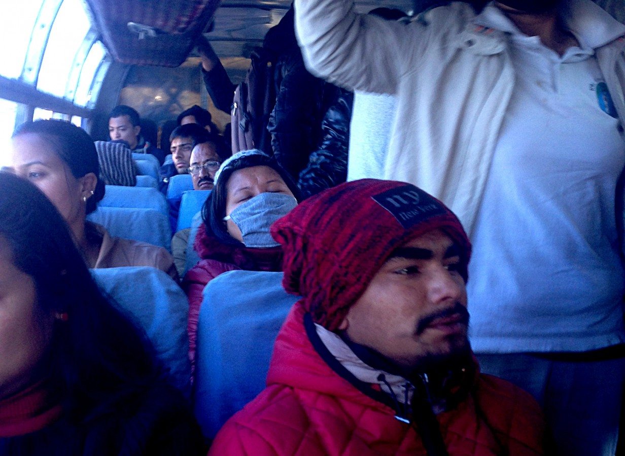 This is the view you want to see the most – the inside of a bus, sparsely packed enough to allow the arm movement required to take a photo. These early morning commuters have been smart enough to travel before rush hour, which sometimes helps. Photo: Patrick Ward