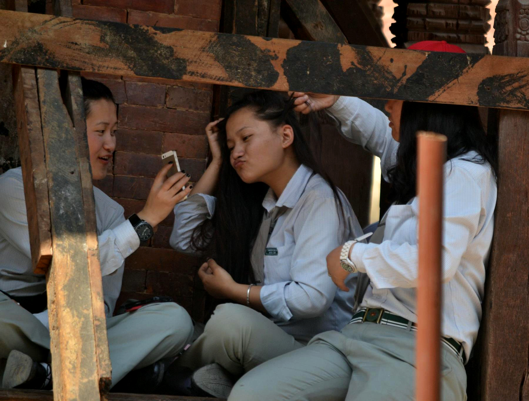 ‘We used to take selfies with the nice background of temples. Now we try to hide it’